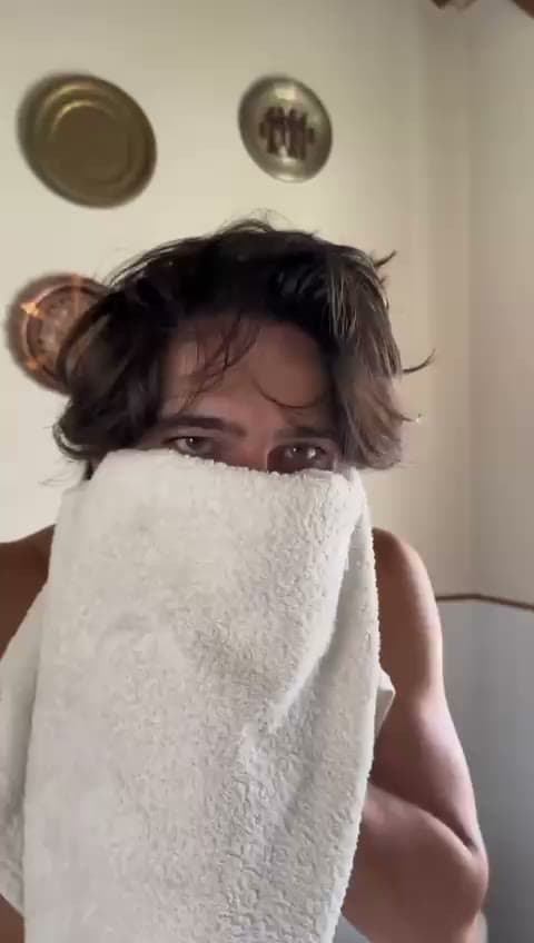 Skincare creator demonstrating a serum